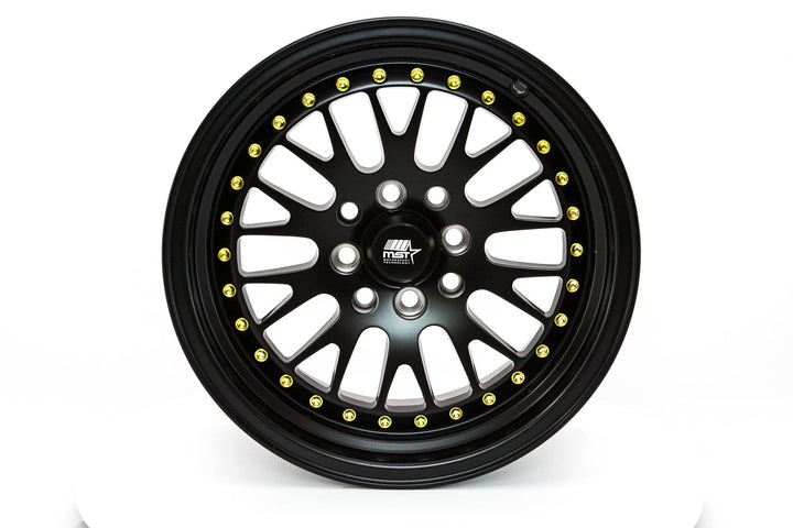MT10 - Matte Black w/Gold Rivets - 15x8.0 4x100/4x114.3 Offset +25
